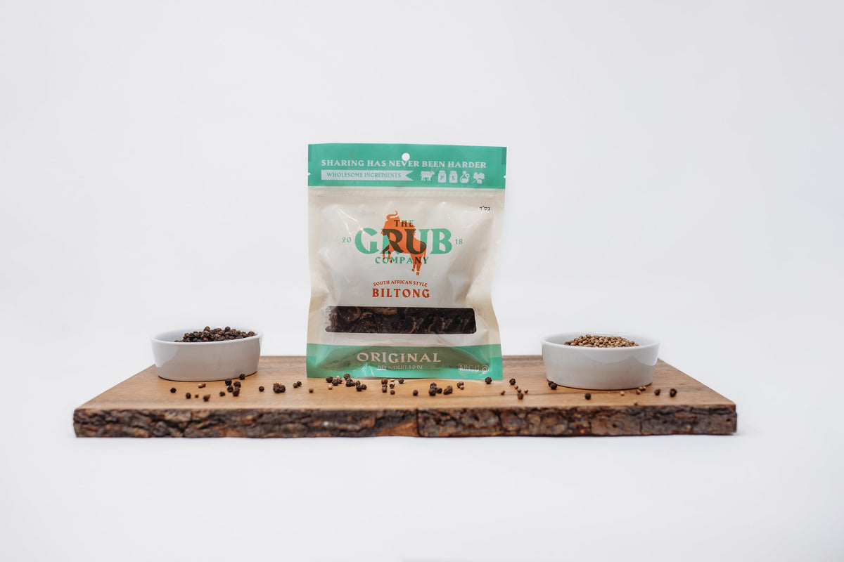 A biltong pouch on a wooden board