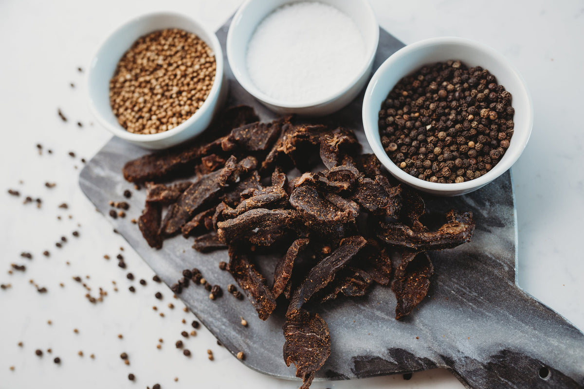 Sliced biltong with whole coriander seed and salt