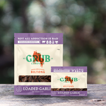 Biltong pouches on a wooden surface outdoors